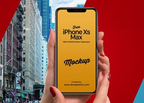 Free iPhone Xs Max in Female Hand Mockup PSD