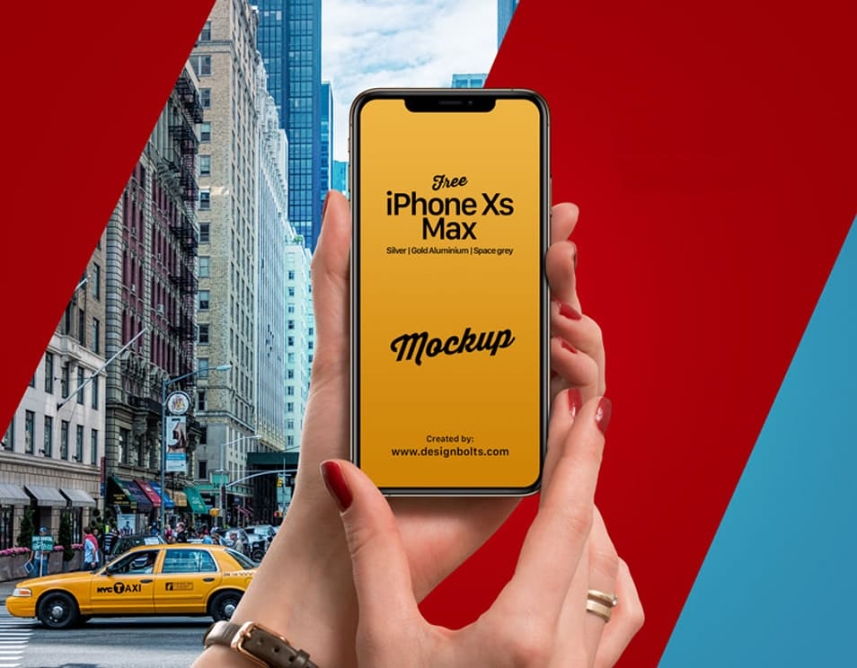 Free iPhone Xs Max in Female Hand Mockup PSD