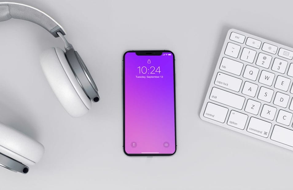 Modern iPhone x Mockup on a Workspace