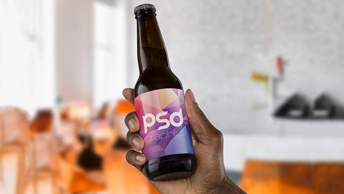 Beer Bottle in Hand Mockup
