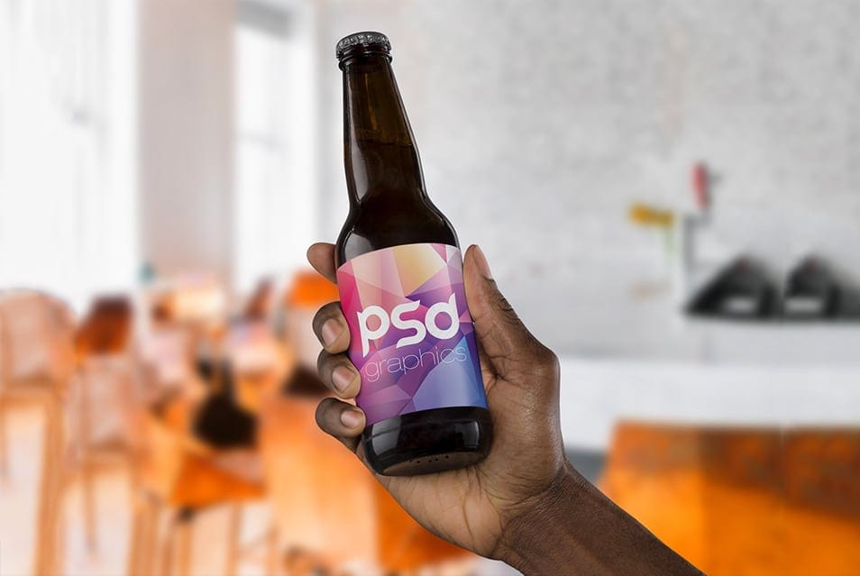 Beer Bottle in Hand Mockup