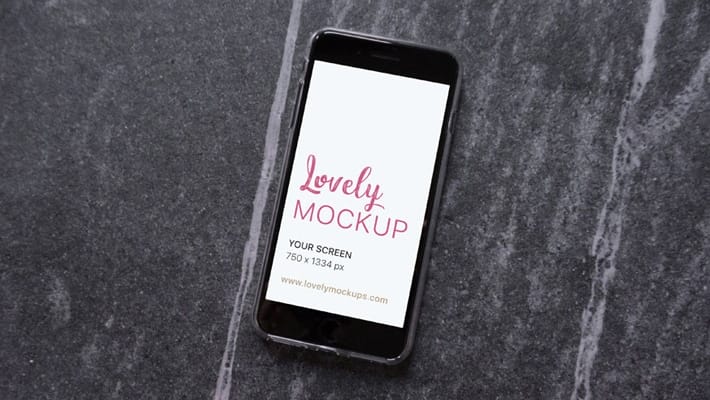 Black iPhone Mockup on A Stone Floor