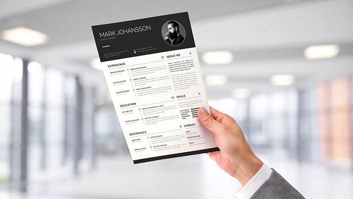 Free A4 Resume / Letterhead Paper in Male Hand Mockup PSD