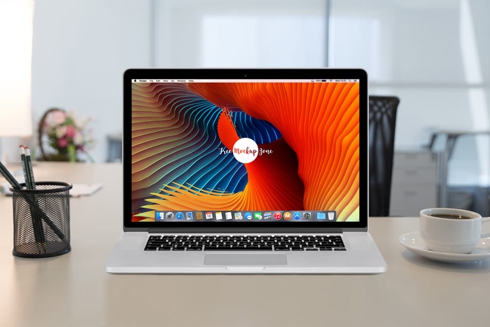 Free Apple MacBook Pro Retina on Workstation Mockup