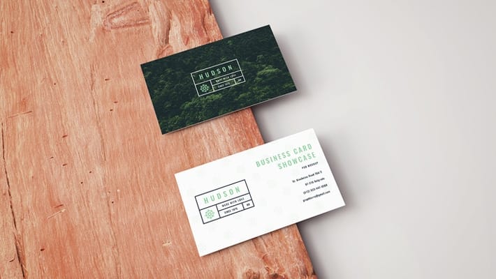 Free Business Card Mockup on a Wooden Board