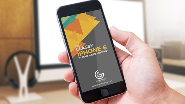 Free Classy iPhone 6 in Man Hand Mockup