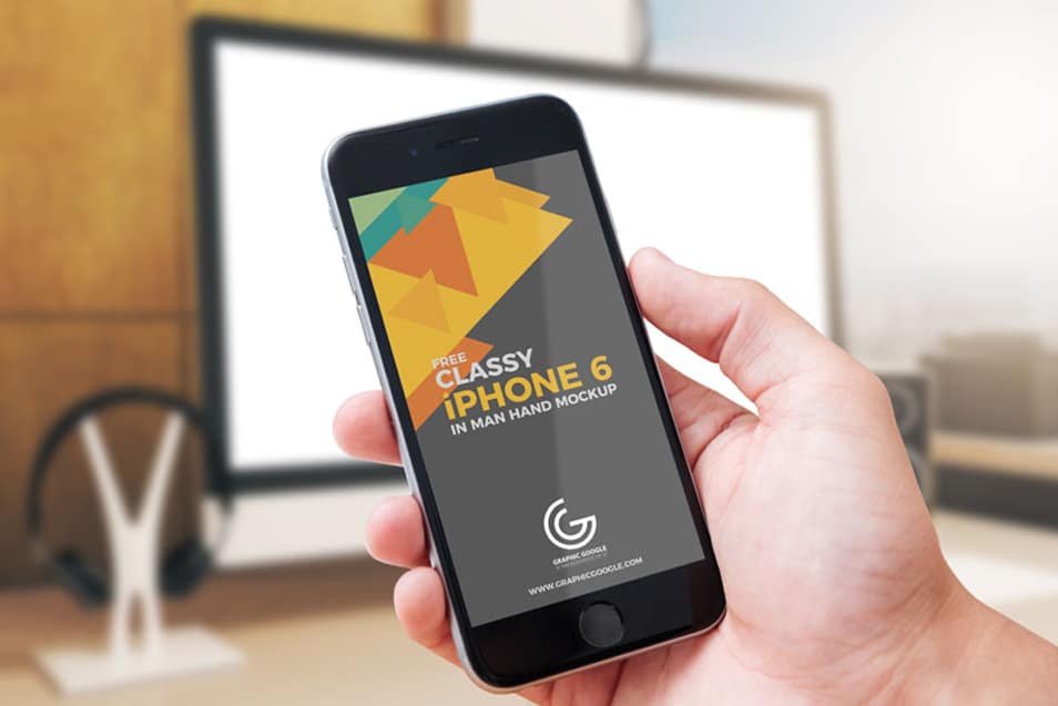 Free Classy iPhone 6 in Man Hand Mockup