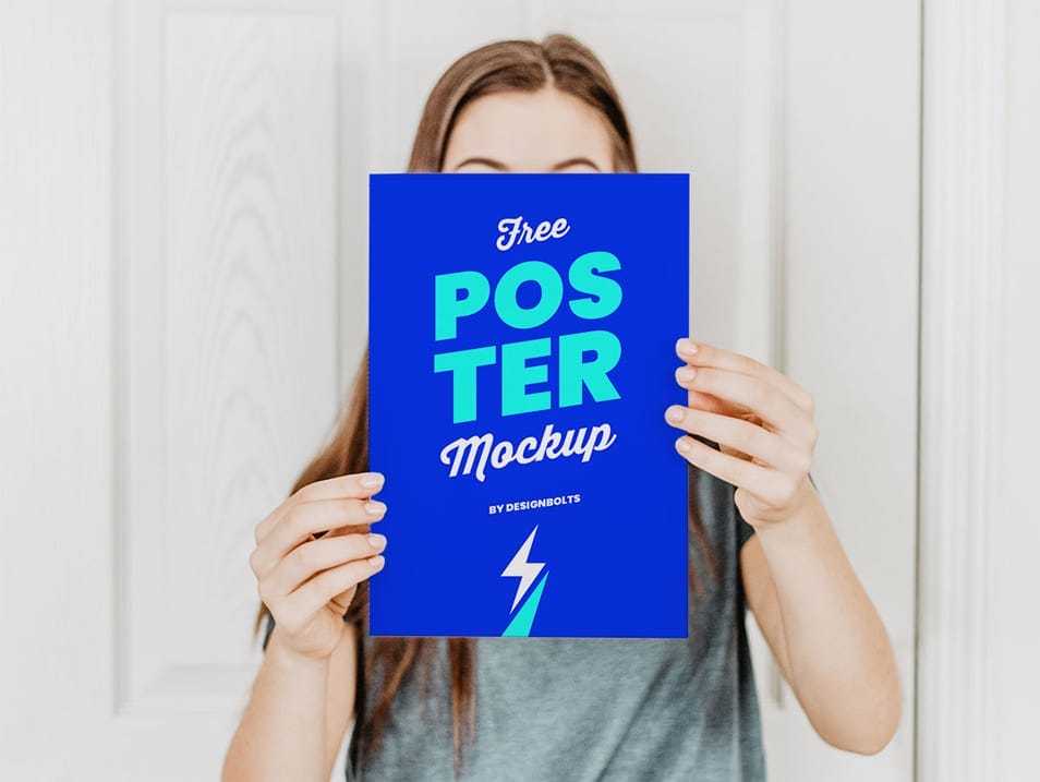 Free Female Hand Holding Poster Mockup PSD