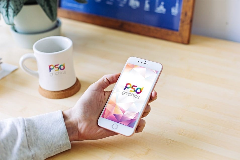 Male Holding iPhone Mockup PSD