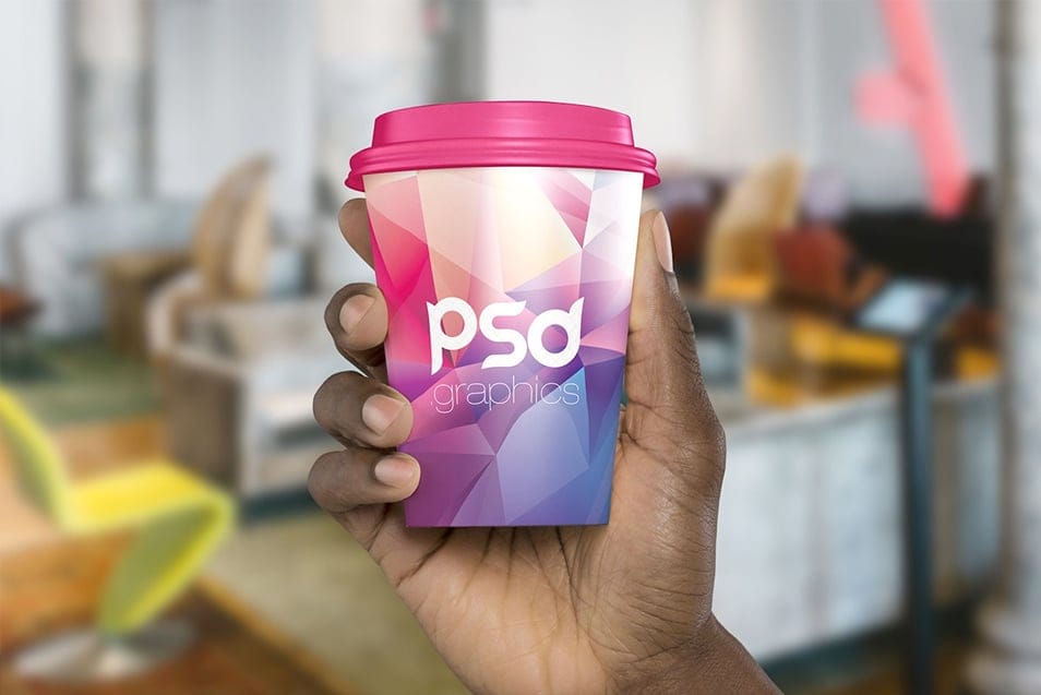 Paper Coffee Cup in Hand Mockup