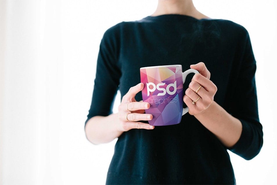 Woman Holding Coffee Mug Mockup PSD