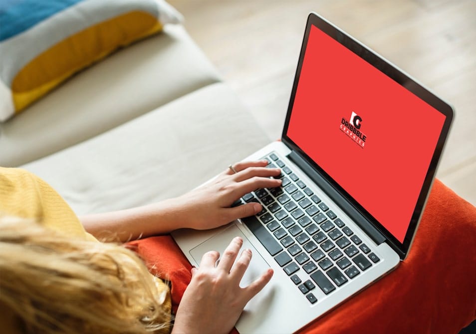 Free Girl Working on Laptop Mockup PSD