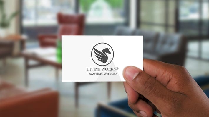 Free Hand Holding Business Card Mockup PSD