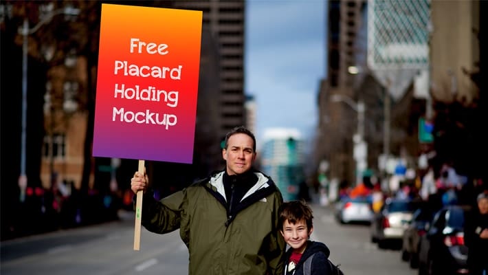 Free Placard Holding Mockup
