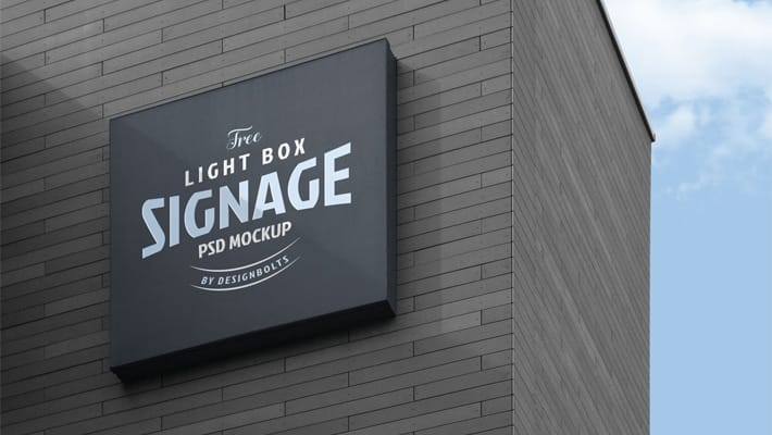 Free Wall Mounted Company Logo Signage Board on Building Mockup PSD