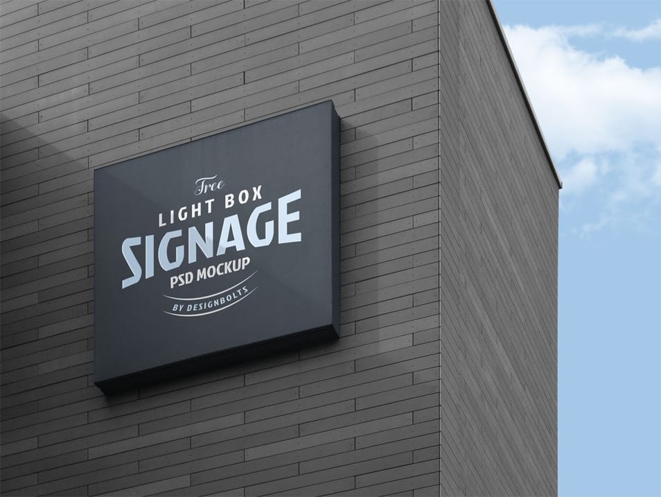 Free Wall Mounted Company Logo Signage Board on Building Mockup PSD