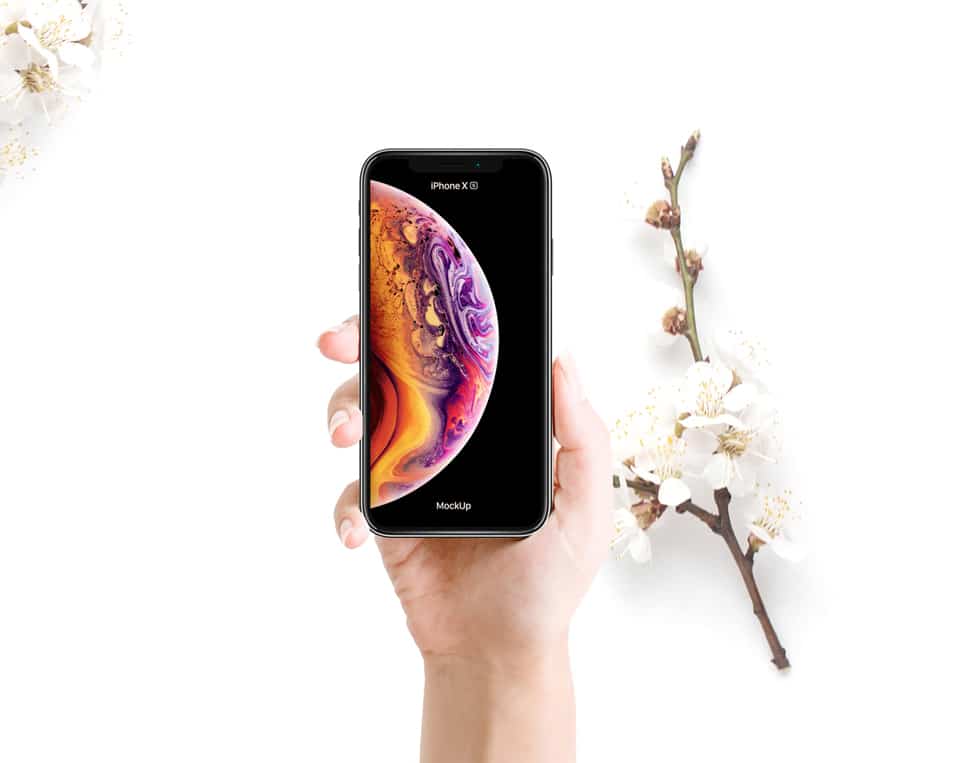 Free Woman Holding iPhone XS Mockup PSD With Flowers
