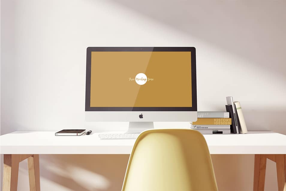 Free iMac Pro on Designer Table Mockup PSD