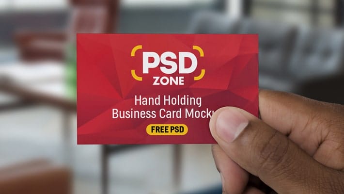 Hand Holding Business Card Mockup PSD