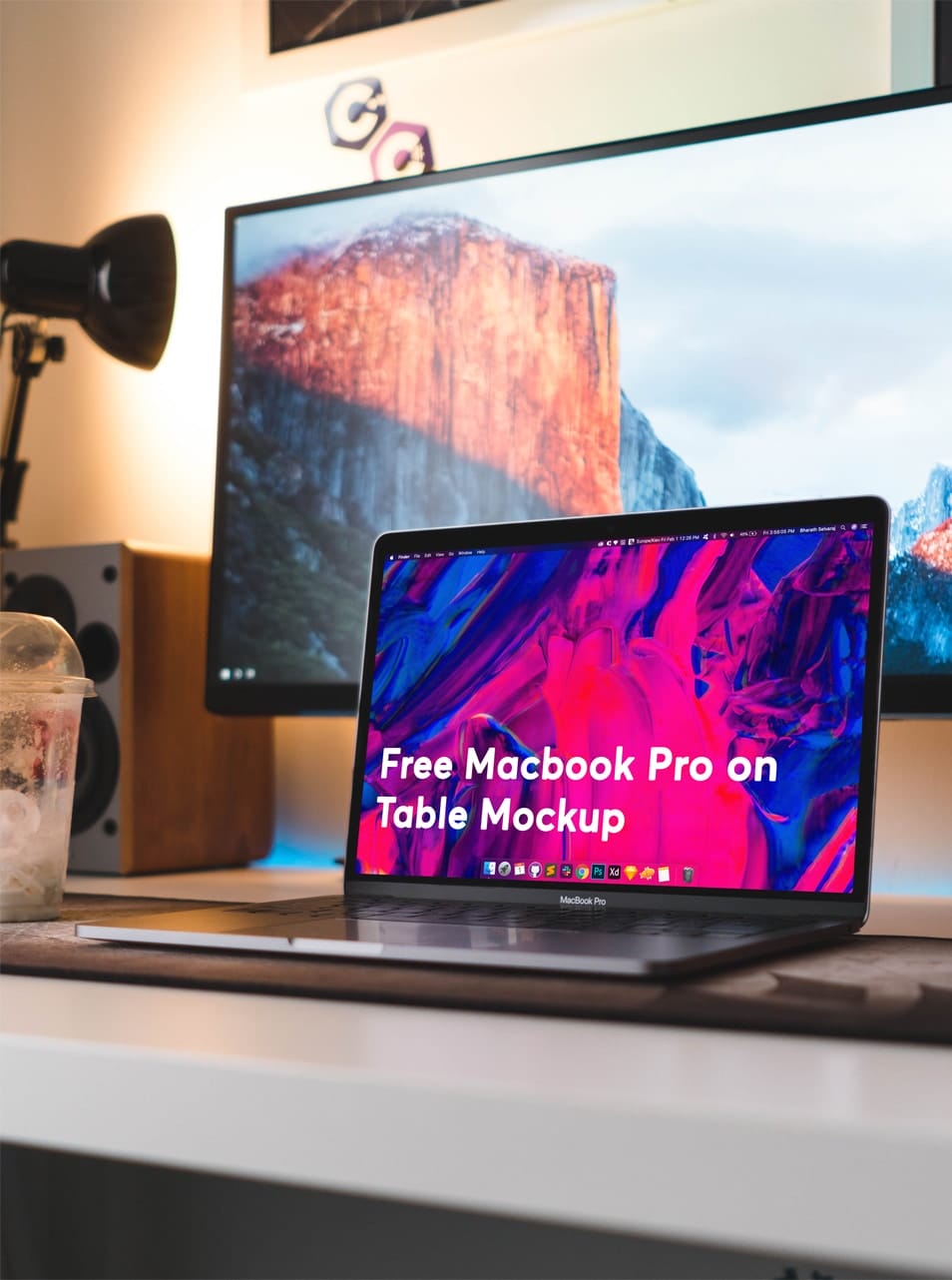 Free Macbook Pro on Table Mockup