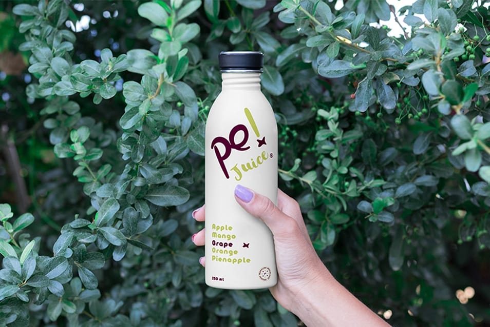 Hand Holding Bottle Mockup