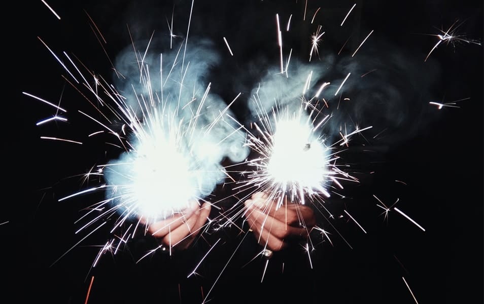 Person Holding Sparklers
