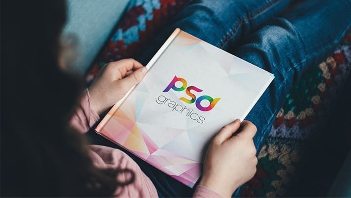 Woman Holding Hardcover Book Mockup