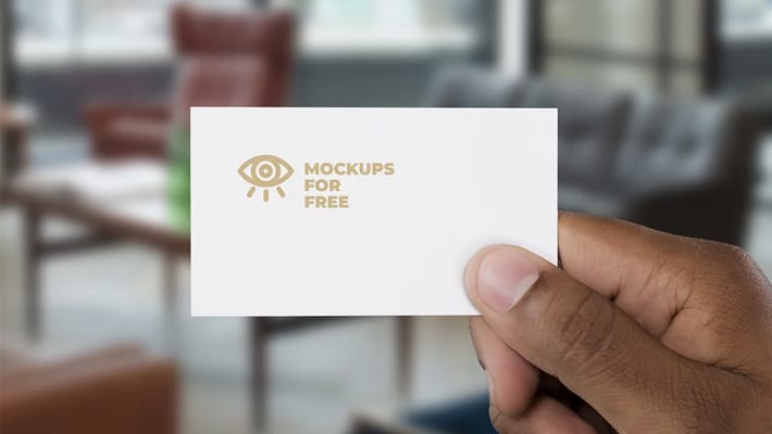 Business Card In Hand Mockup