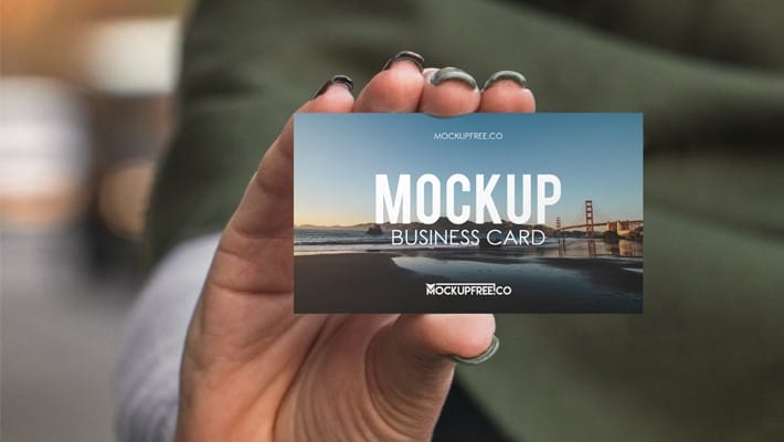 Business Card in Hand Free PSD Mockup