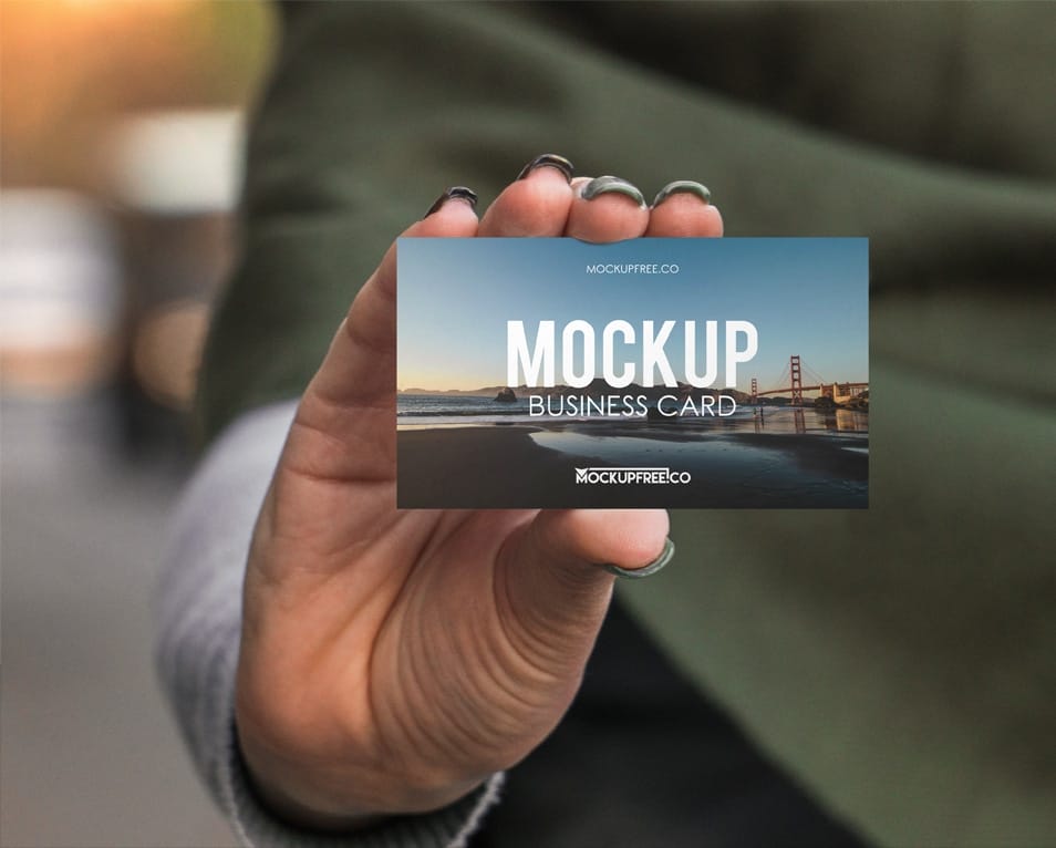 Business Card in Hand Free PSD Mockup