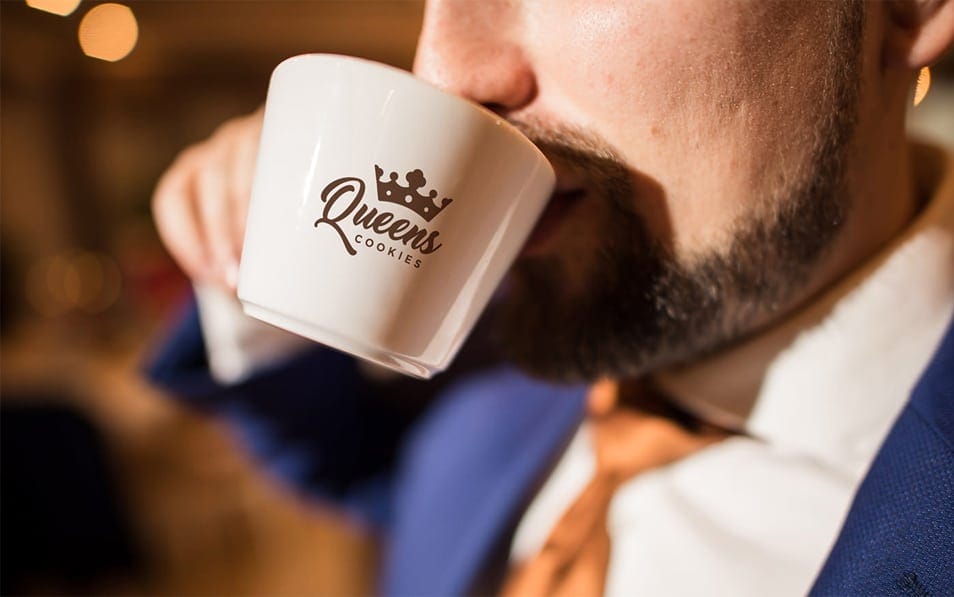 Coffee Cup and a Man in a Suit Free Mockup