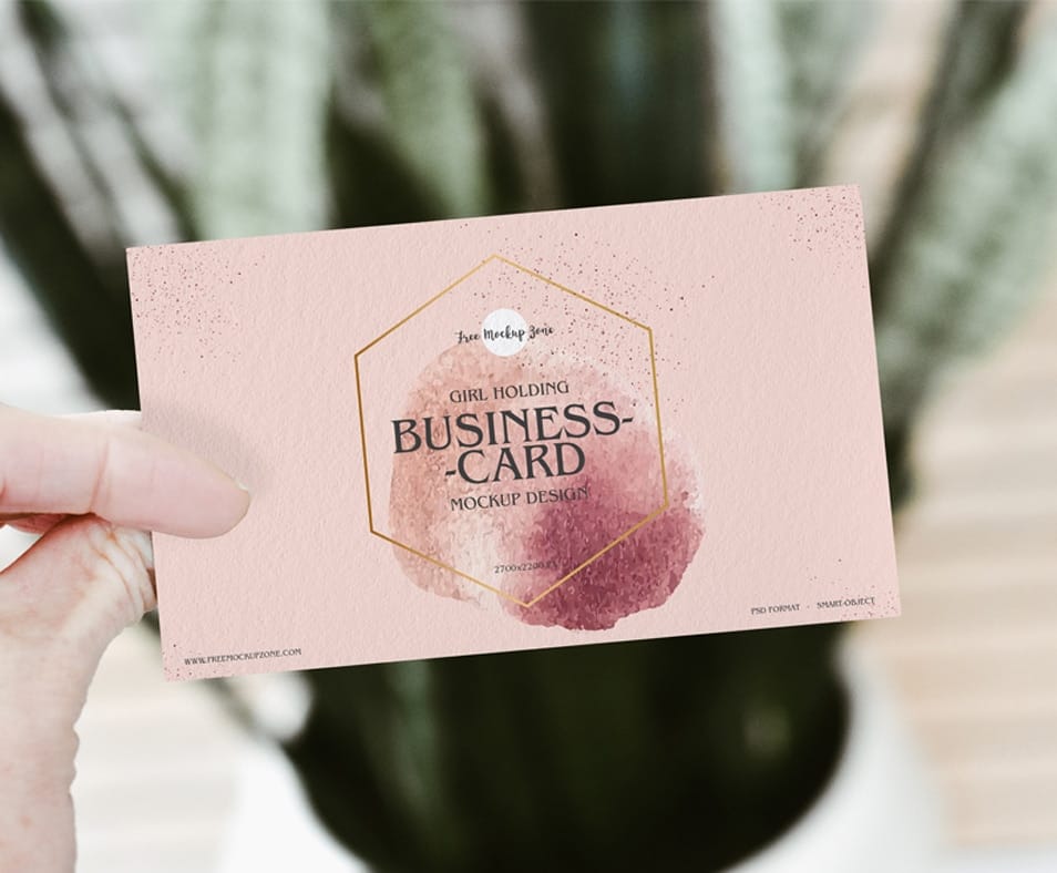 Free Girl Holding PSD Business Card Mockup Design