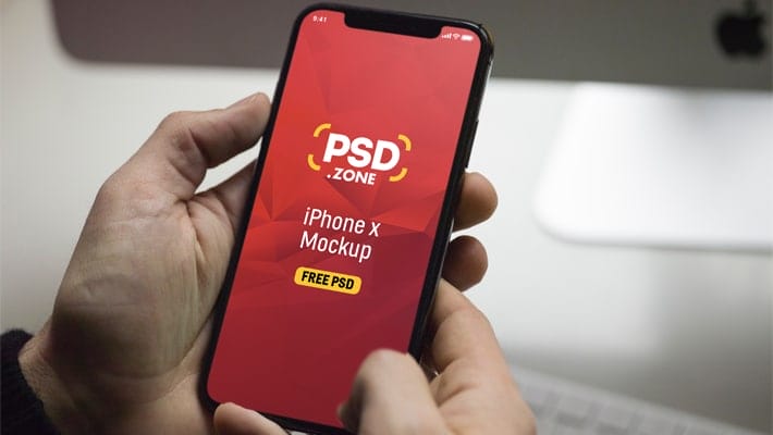 iPhone X in Hand Mockup PSD