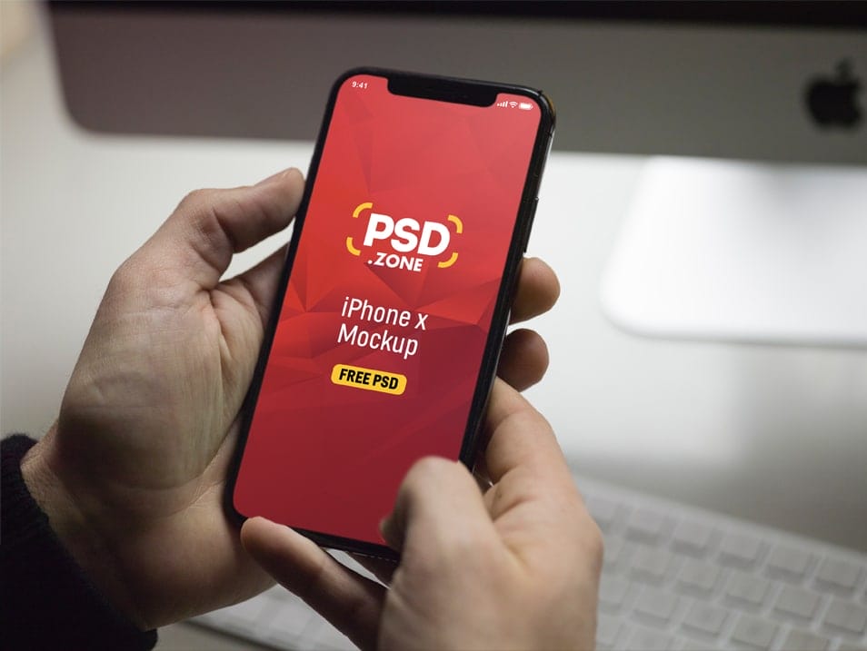 iPhone X in Hand Mockup PSD
