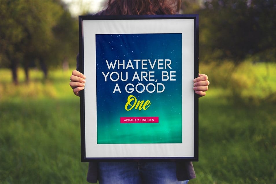 Free Hand Holding Poster Frame Mockup PSD