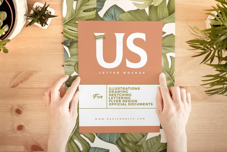 Free Hand Holding White US Letter Paper Mockup PSD