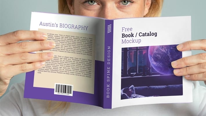 Free Hand Holding Square Book Mockup PSD