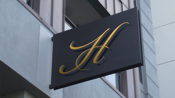 Free Hotel Wall Mounted Signage Mockup PSD