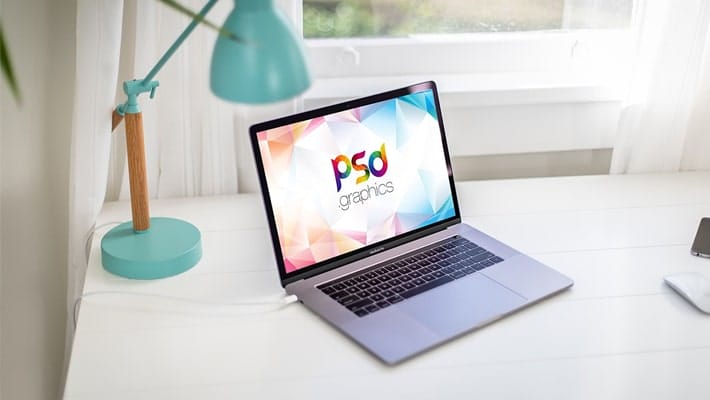Free Macbook Pro on Table Mockup