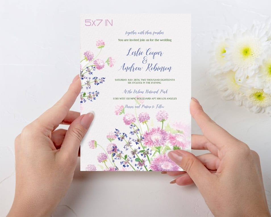 Free Wedding Invitation held in Hands Mock-up in PSD