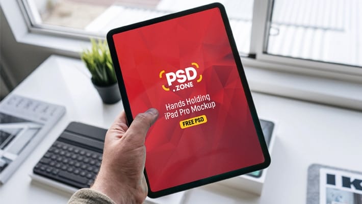 Hand Holding New iPad Pro Mockup