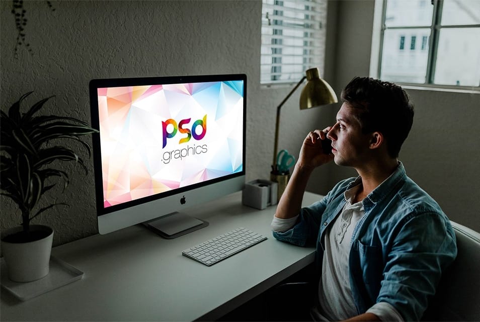 Man Working on iMac Mockup
