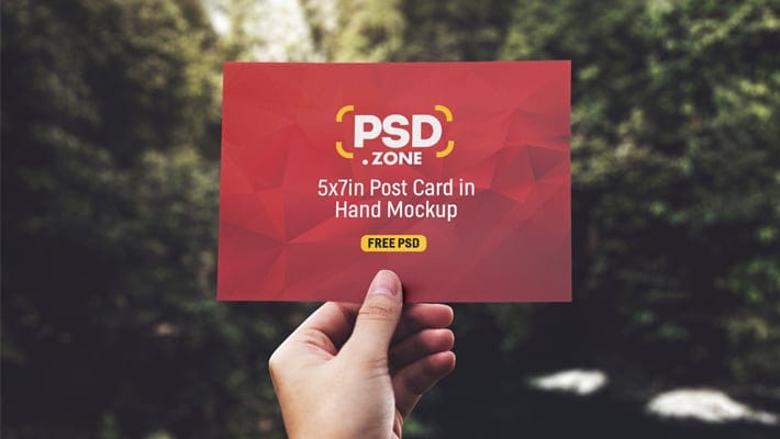 PSD Hand Holding Postcard Mockup