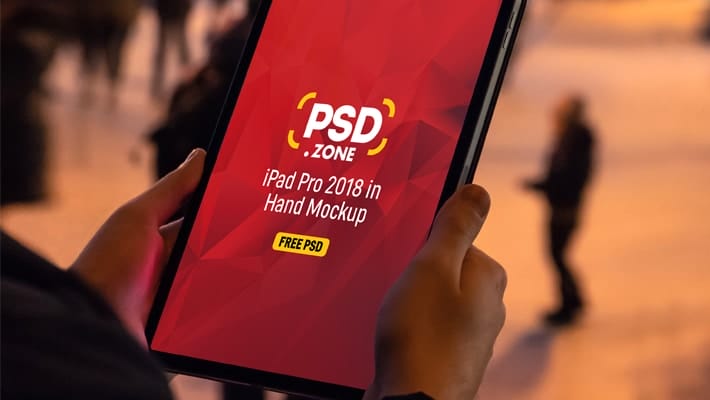 iPad Pro in Hand Mockup Free PSD