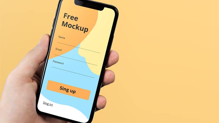 iPhone X in Hand Mockup