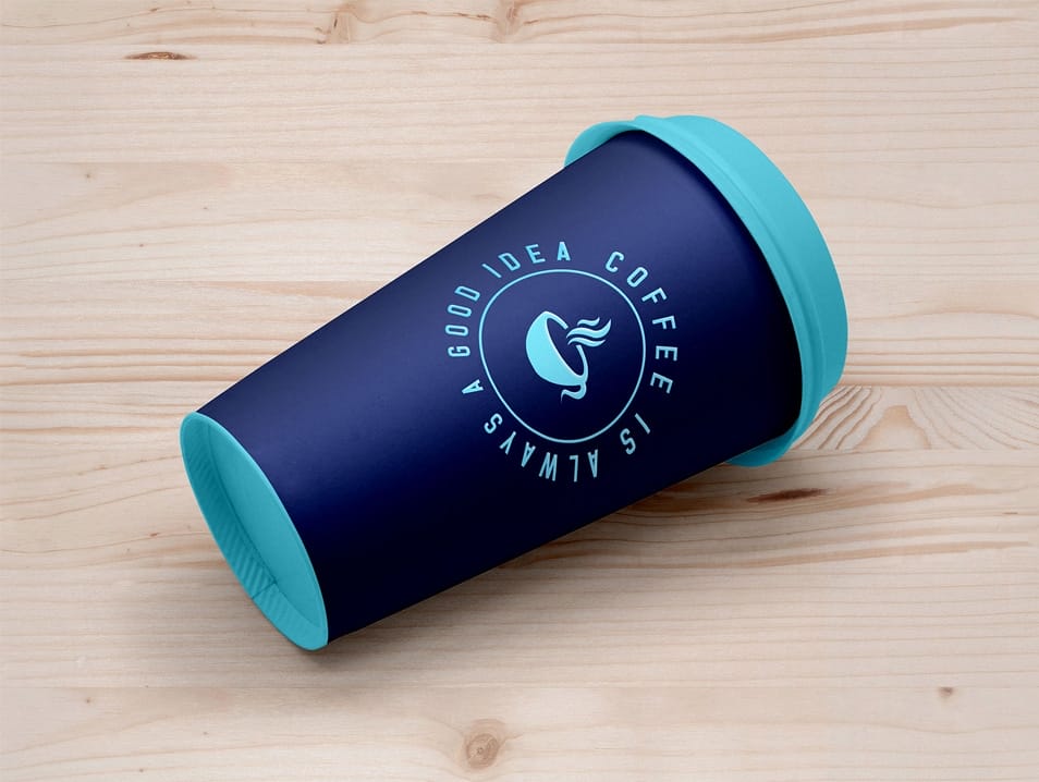 Free Coffee Cup Lying on Floor Mockup PSD