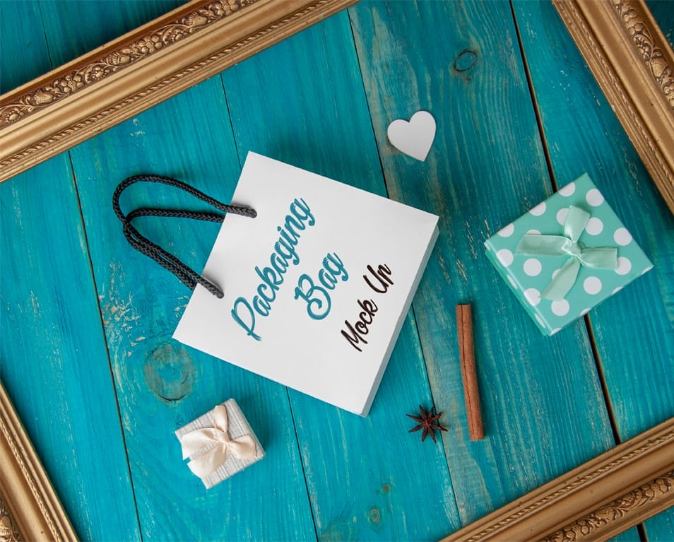 Free PSD Gift Bag Mockup on a Blue Background