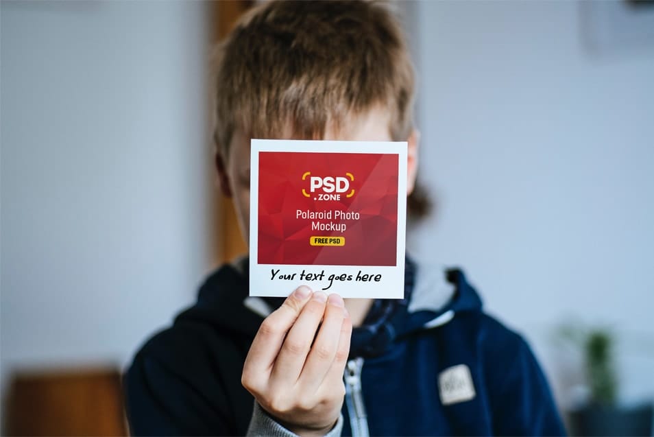 Hand Holding Polaroid Photo Mockup