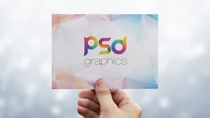 Holding Postcard in Hand Mockup