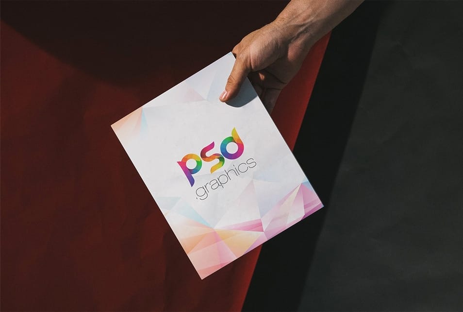 Man Holding A4 Paper Mockup